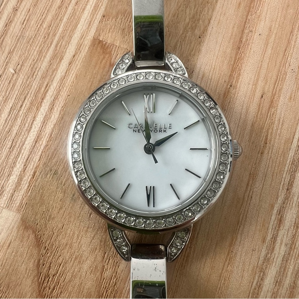 Caravelle New York ladies silver tone dress watch NEW BATTERY